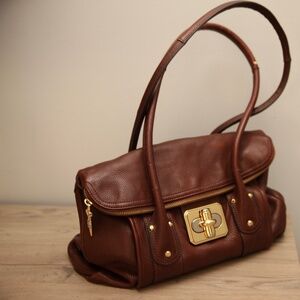 B. Makowsky brown leather bag